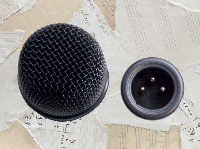 Two ends of the E845 - metal grille and XLR socket