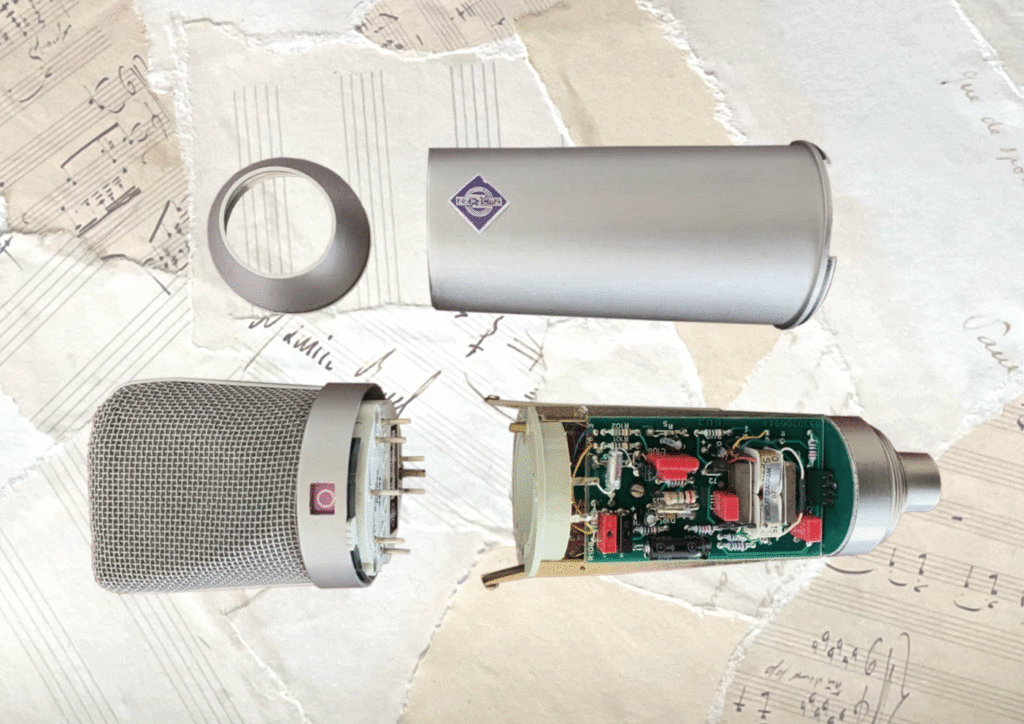Inside the Neumann U87 - the capsule is under the grille (left) and the electronics are housed in the main body (right)